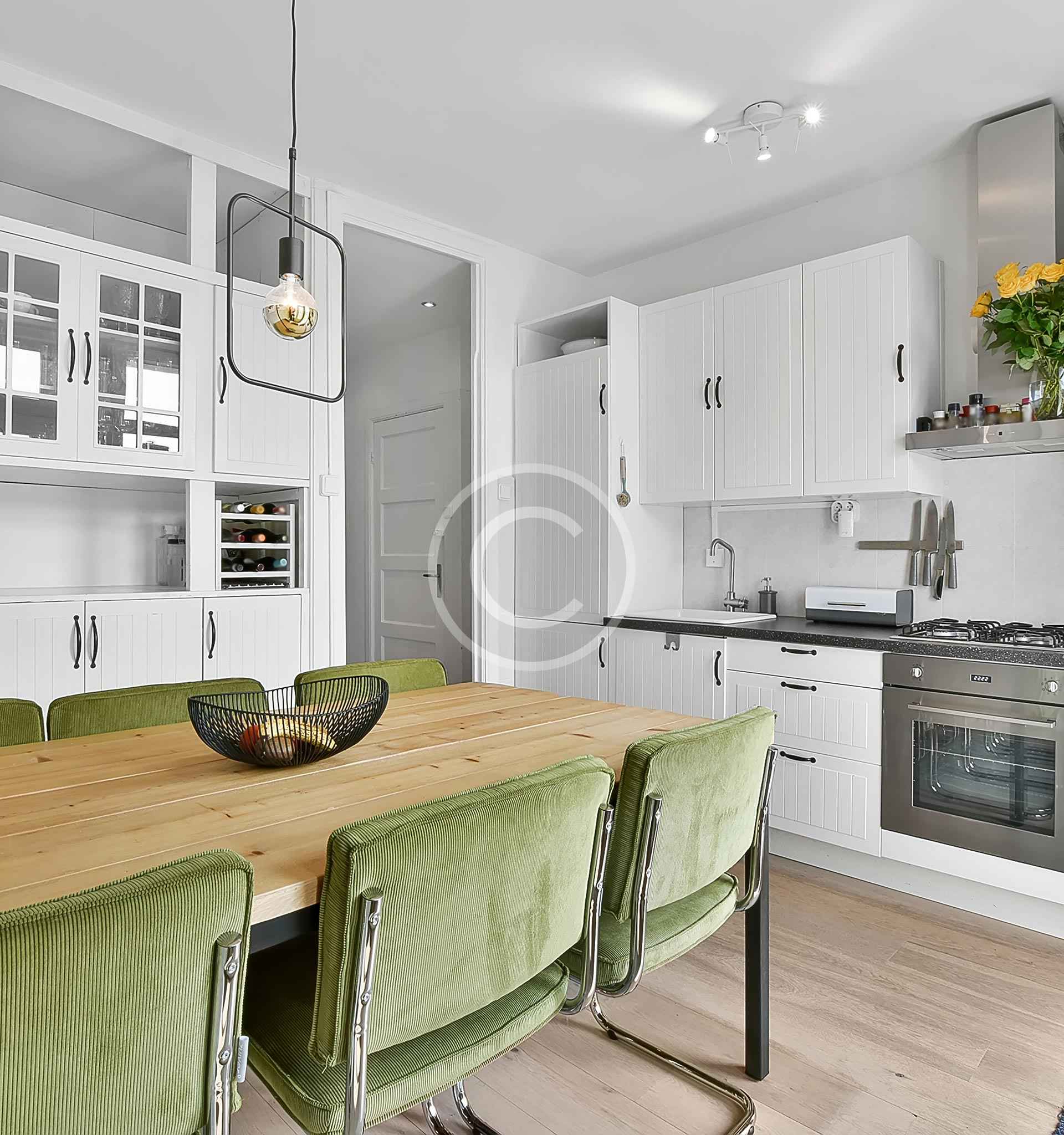 Overhead and base laundry cabinets